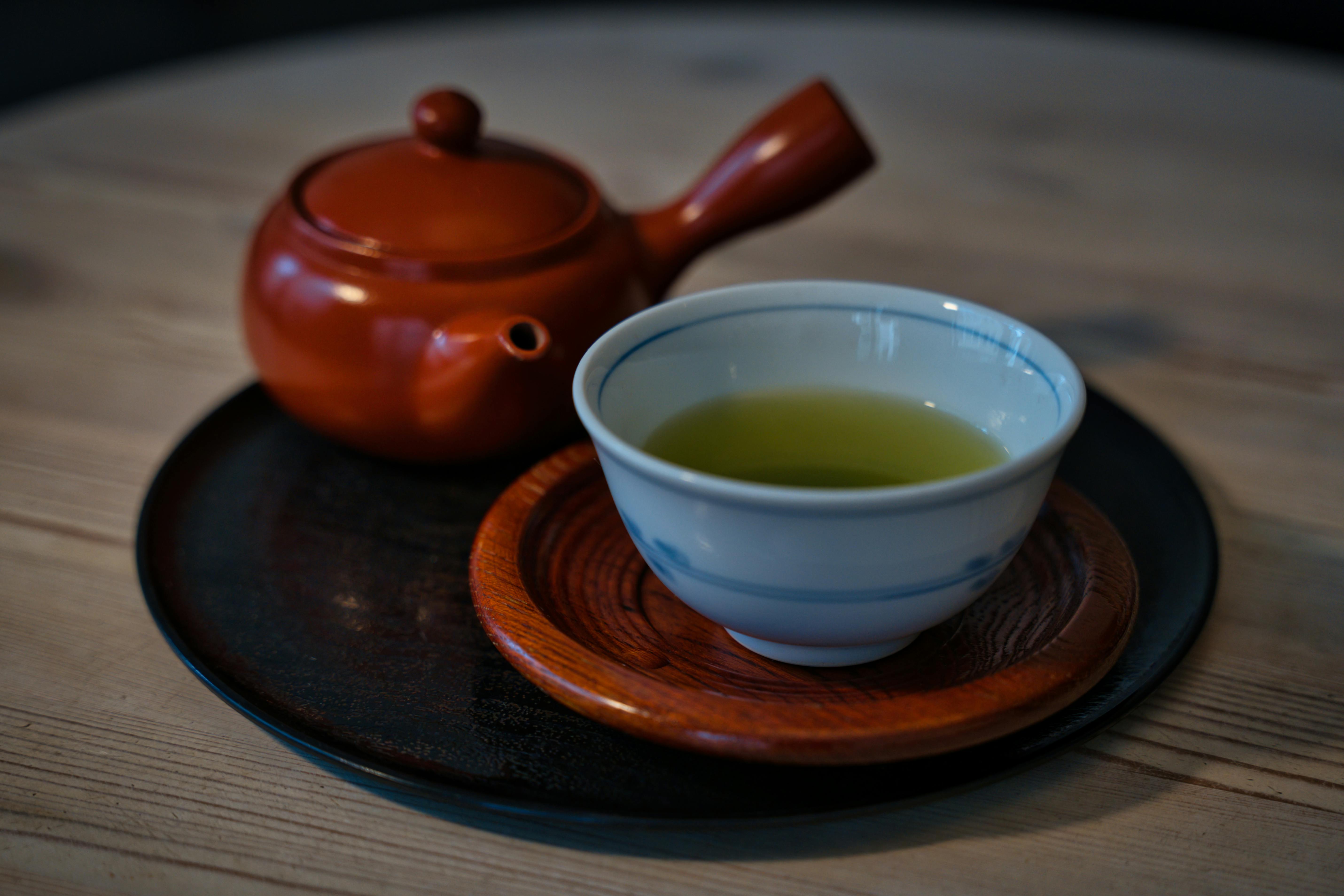 Brown clay Japanese teapot and cups